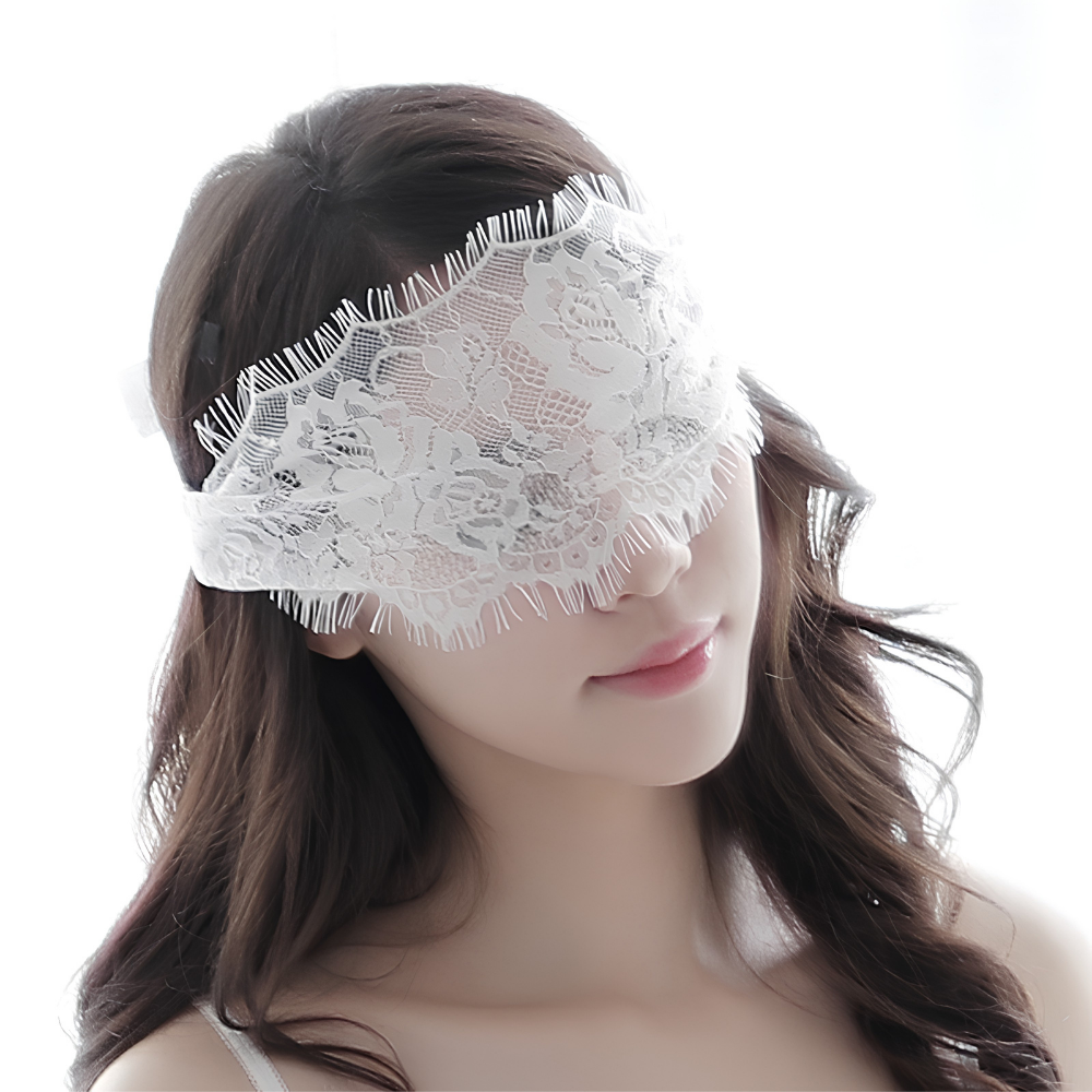 Model wearing a white floral lace eye mask
