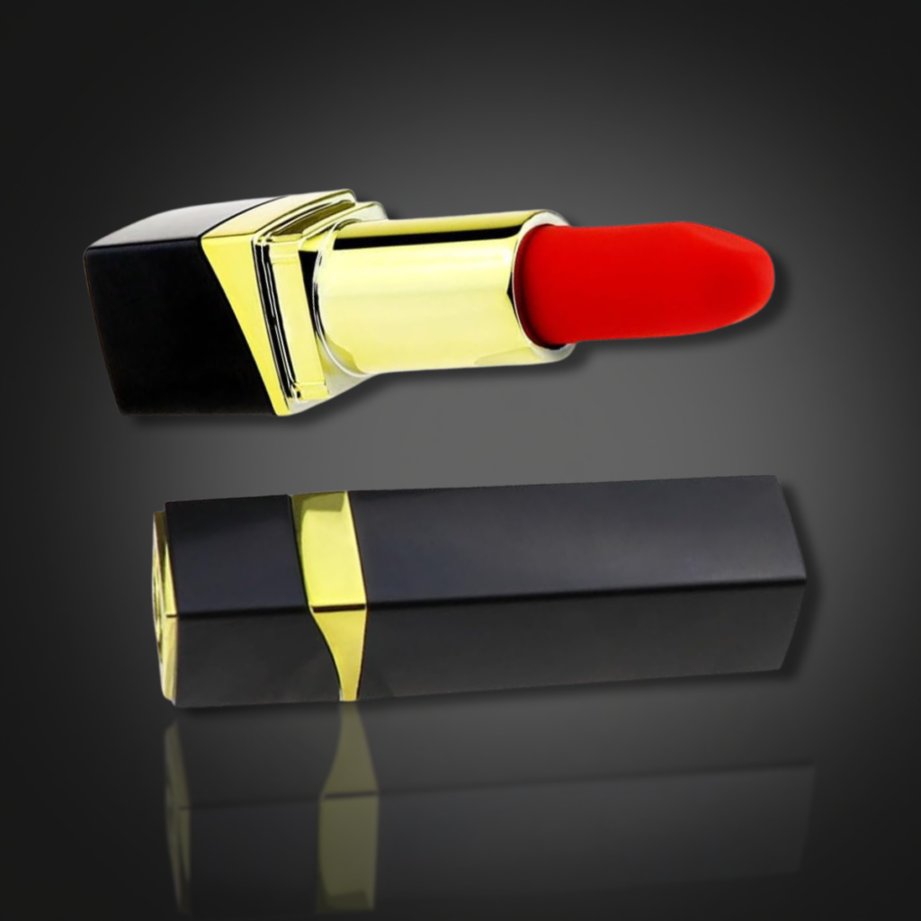 Red lipstick vibrator with black and gold case